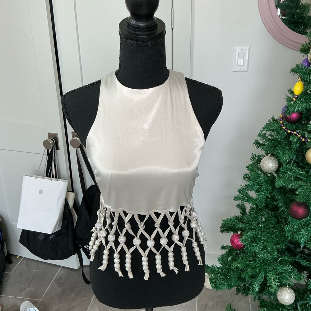 Elegant Cream Sleeveless Top with Fringe